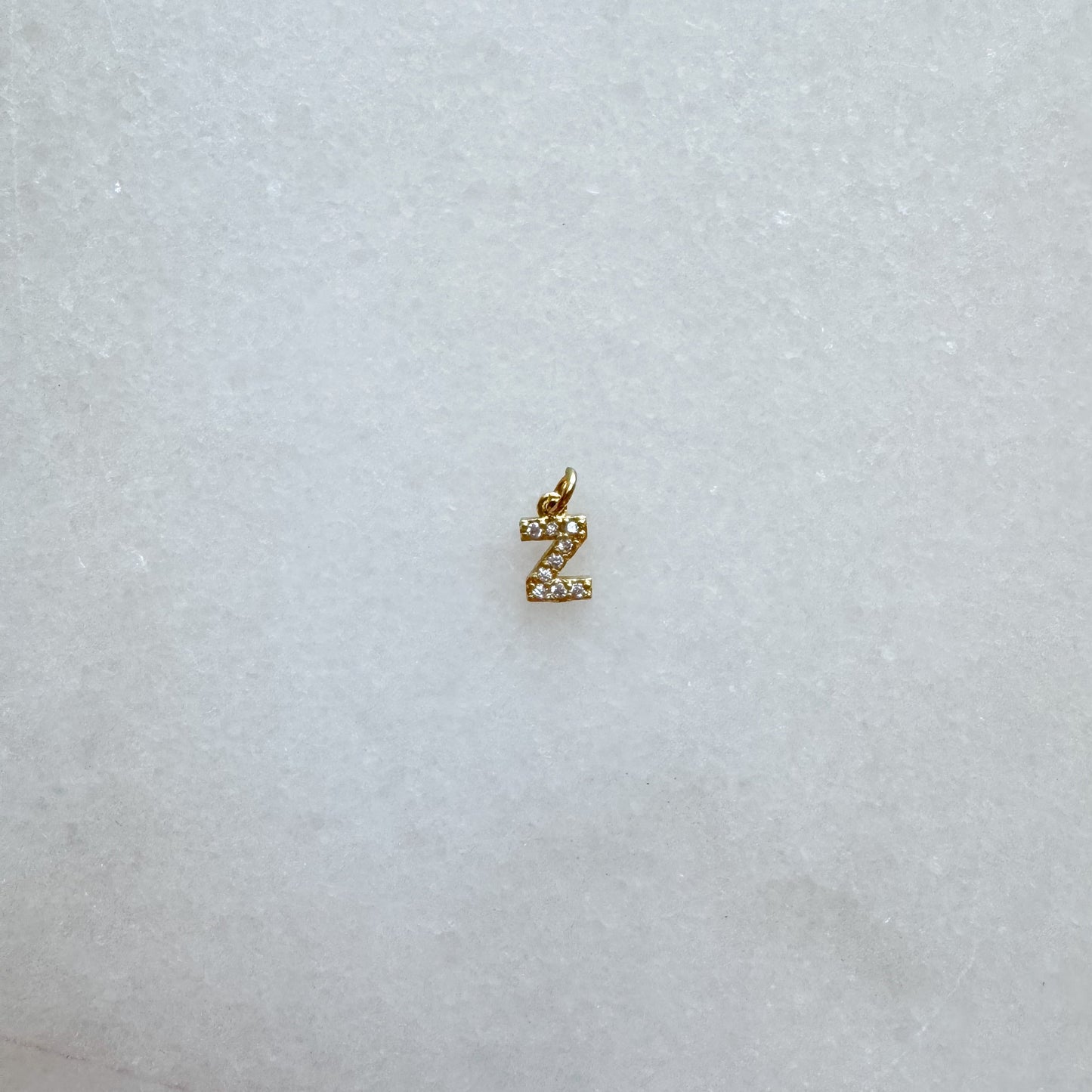 Diamond pavé initial charm set in gold, letter Z