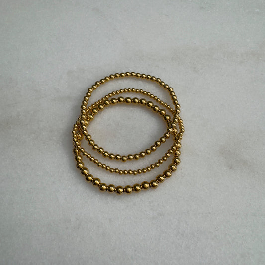 Set of gold beaded bracelets in 3mm, 4mm, and 5mm beads