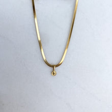 Load image into Gallery viewer, Gold herringbone necklace with coin pendant on a white surface
