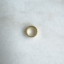 Load image into Gallery viewer, Gold band on a textured white surface
