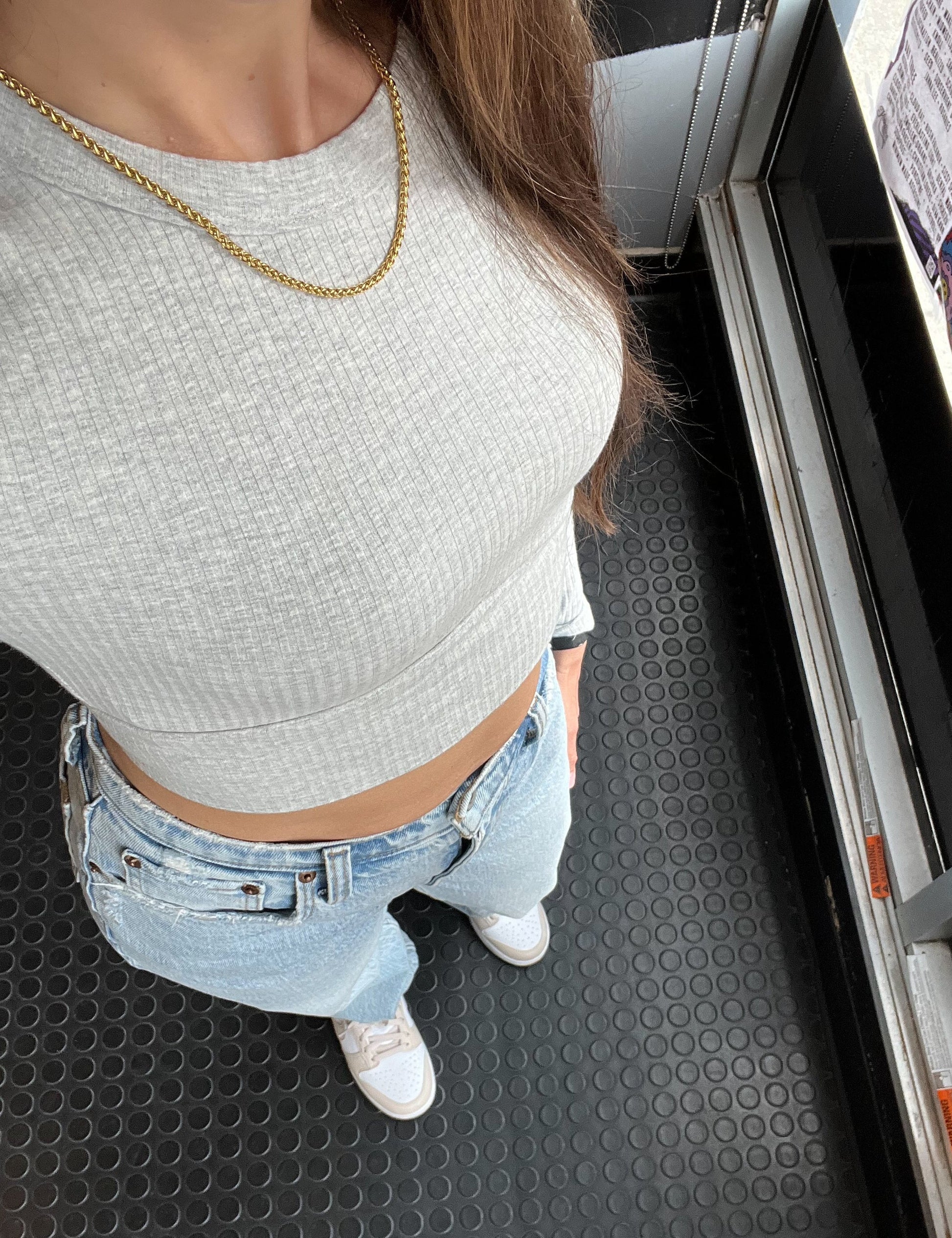 Woman wearing 18 inch 3mm gold-plated franco chain