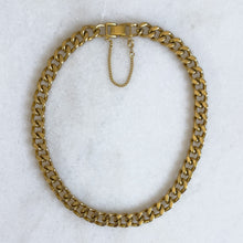 Load image into Gallery viewer, Gold chain necklace on a white background
