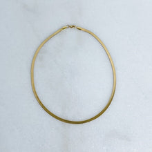 Load image into Gallery viewer, Gold herringbone necklace on a white marble surface
