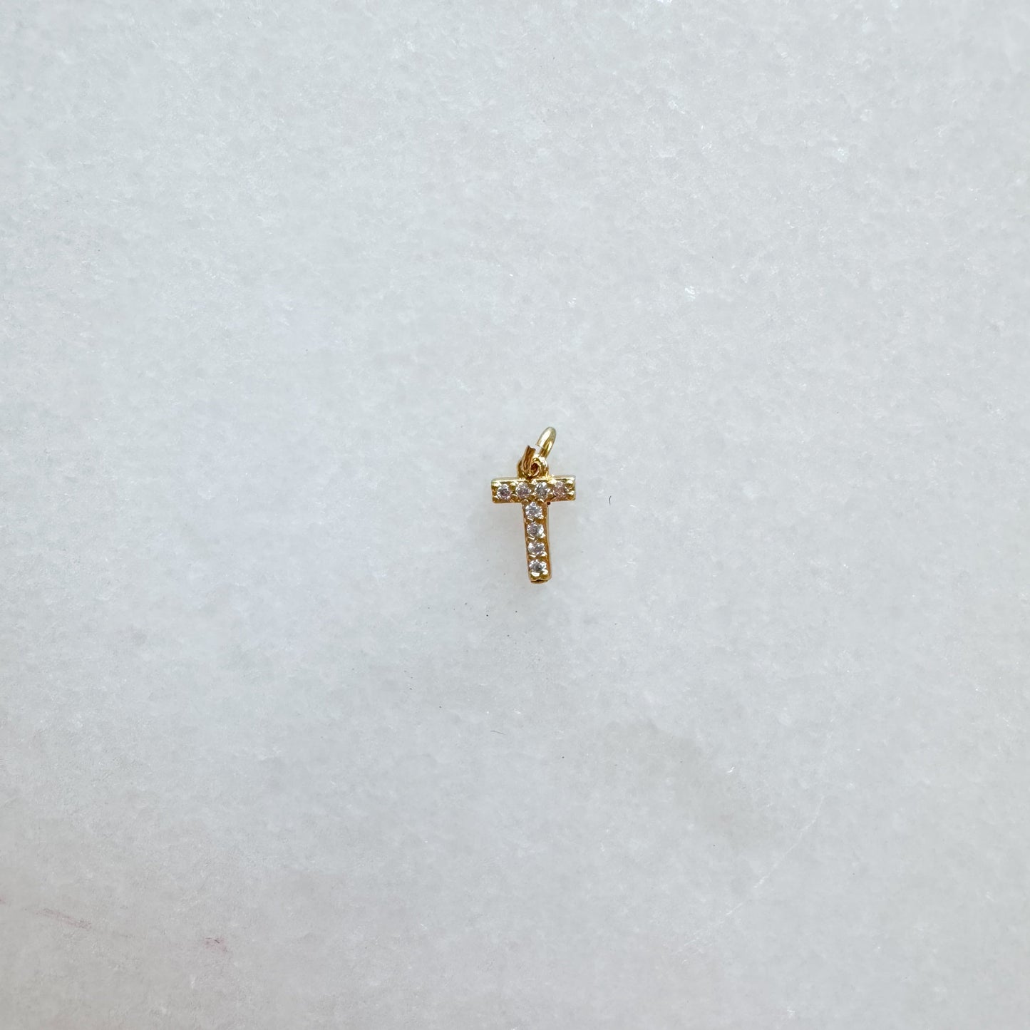 Diamond pavé initial charm set in gold, letter T