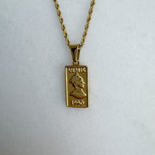 Load image into Gallery viewer, Gold necklace with a rectangle pendant on a white background
