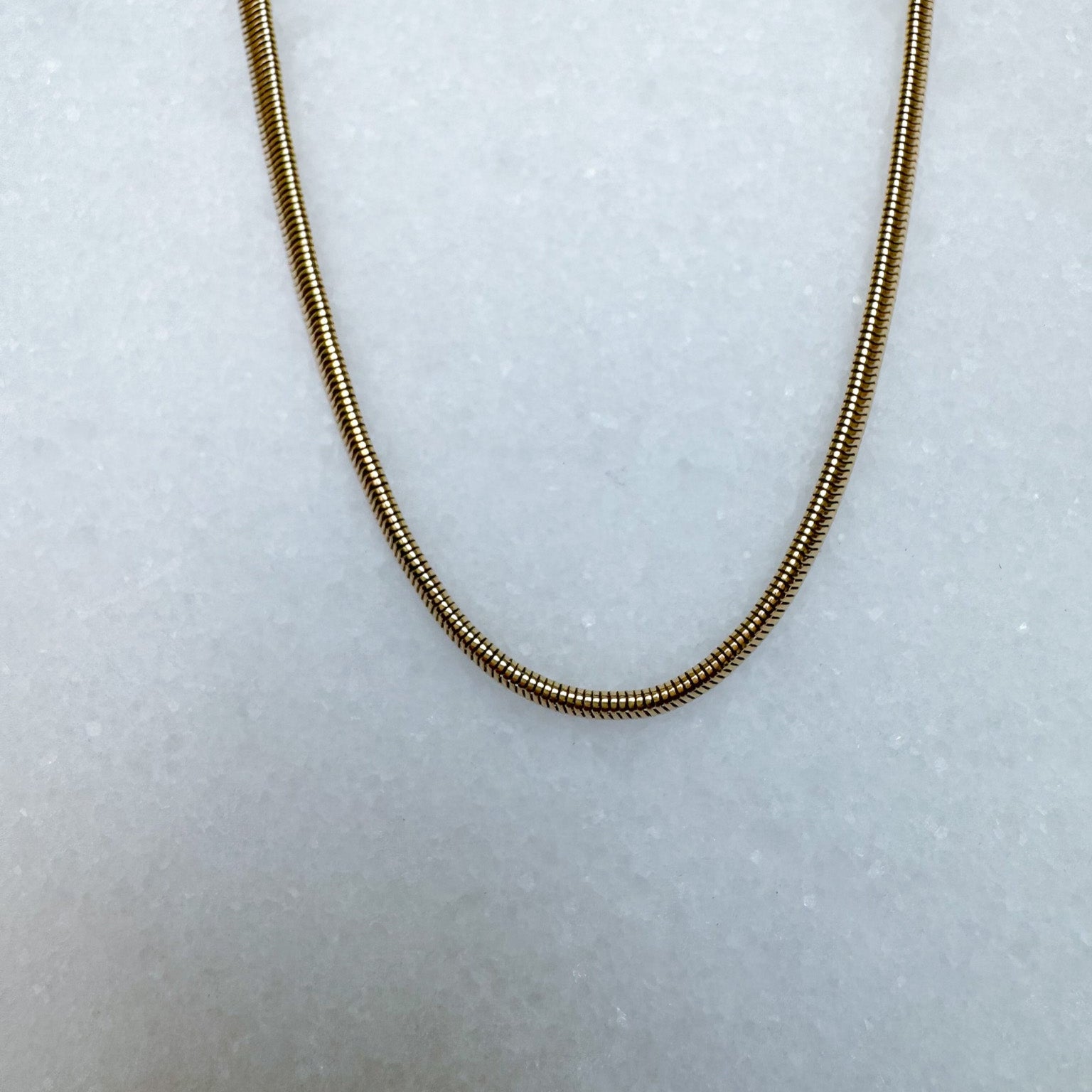 3mm Snake Chain on marble background