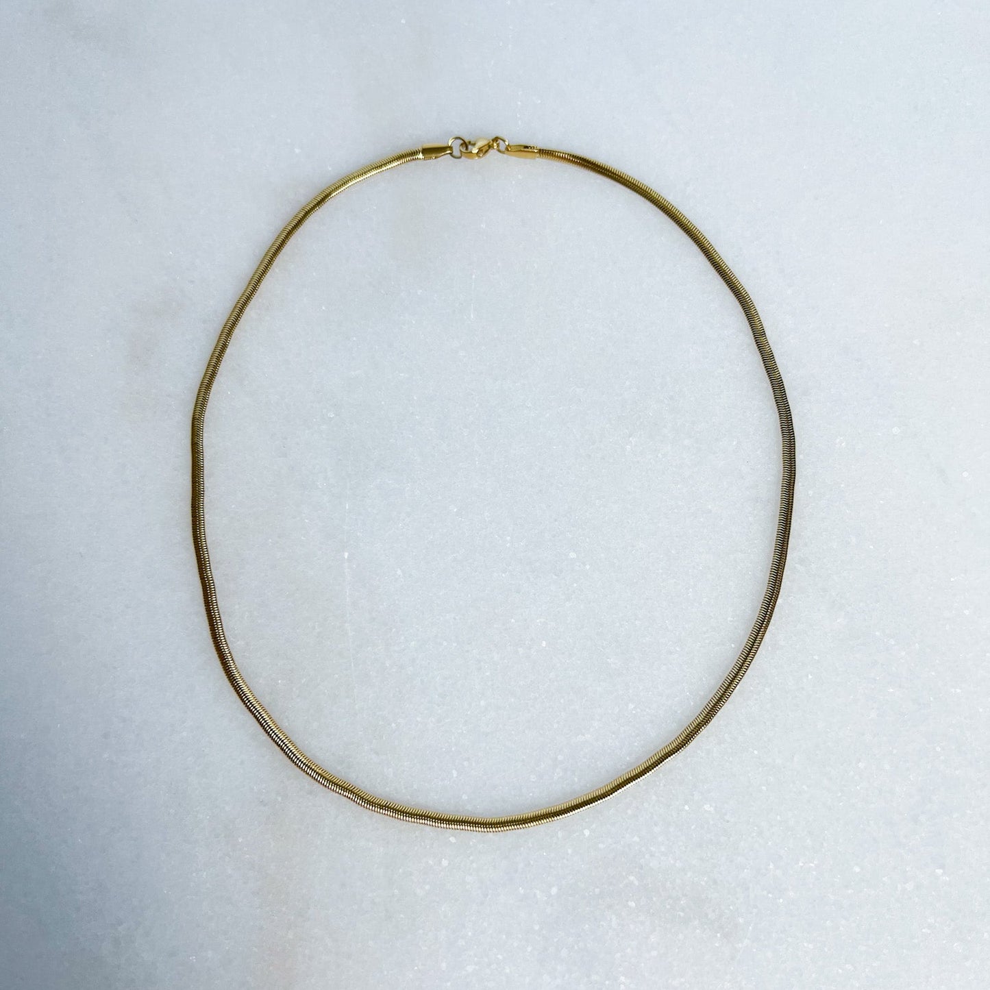 3mm Snake Chain on marble background
