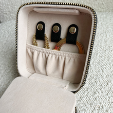 Load image into Gallery viewer, Open 4 inch x 4 inch Black Saffiano Leather Jewelry Travel Case with Gold Zipper Hardware filled with jewelry
