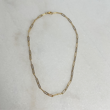 Load image into Gallery viewer, Gold Paperclip Necklace on marble background.
