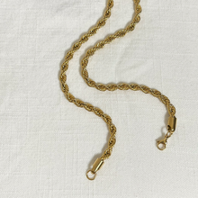 Load image into Gallery viewer, 5mm Gold Rope Chain Necklace on white linen background.

