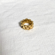 Load image into Gallery viewer, Gold watch link ring on white linen background
