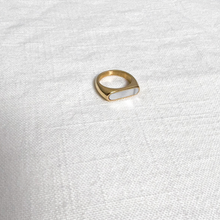 Load image into Gallery viewer, Gold signet ring with white enamel on white linen background
